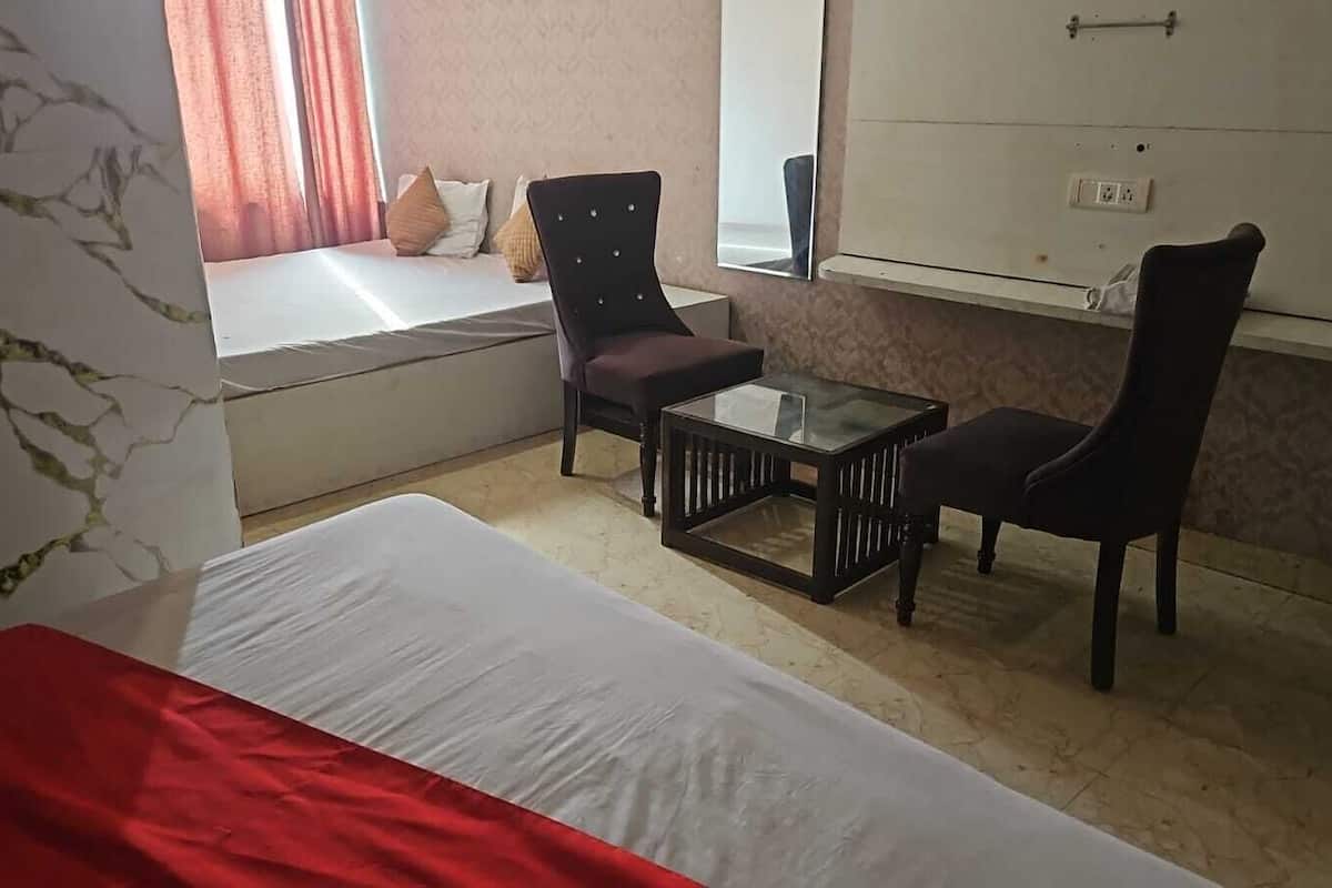 Quarto família, ar-condicionado | Camas extras/dobráveis (sobretaxa), Wi-Fi de cortesia, roupa de cama