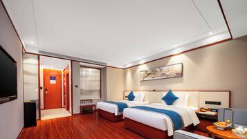 Down duvets, Select Comfort beds, minibar, desk