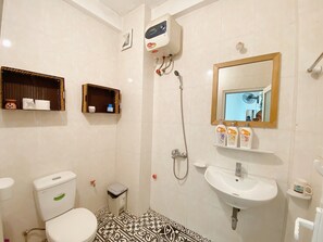 A bathroom with a toilet, sink, shower, and a mirror. - Fun 1BR w/Games, Budget Stay in Hanoi Old Quarter, Max 4, Locker, Free Wash (Hà Nội)