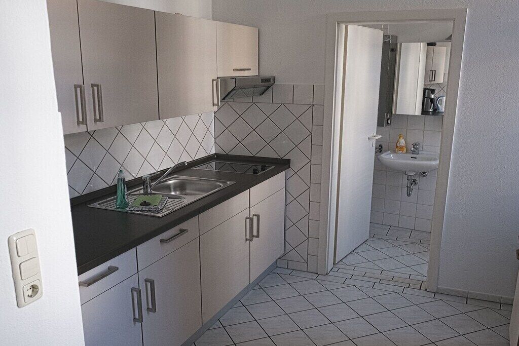 Coffee/tea maker, fridge, stovetop, toaster