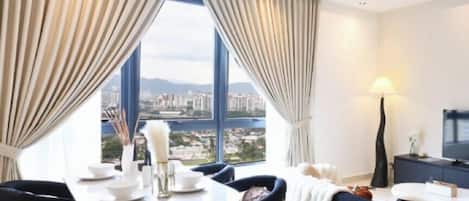 Apartment (Two Bedroom Apartment ) | Living area | 30-inch TV with cable channels