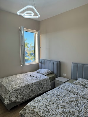 2 chambres, fer et planche à repasser, Wi-Fi, draps fournis
