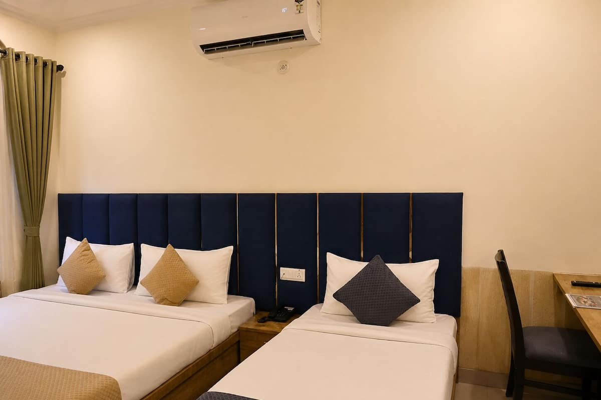 Deluxe Triple Room | Premium bedding, free WiFi, bed sheets