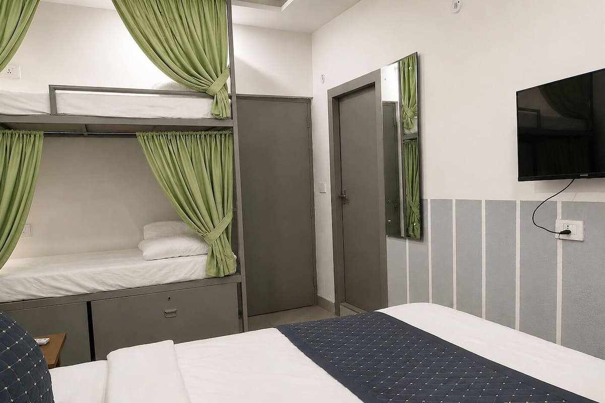 Deluxe Quadruple Room | Premium bedding, free WiFi, bed sheets