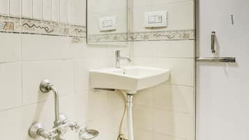 Ducha, artículos de tocador gratuitos, toallas, jabón