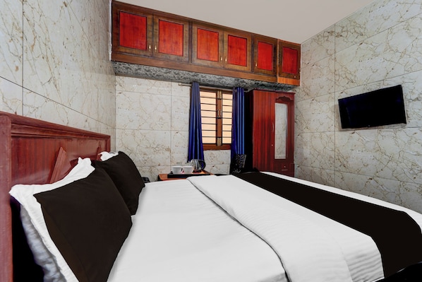 Quarto luxo | Escrivaninha, Wi-Fi de cortesia, roupa de cama