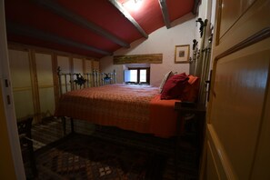 A bedroom with a bed, a window, and a door. - Five Bedroom Estate with Pool and Sweeping Views of Lake and Caccamo (Caccamo)