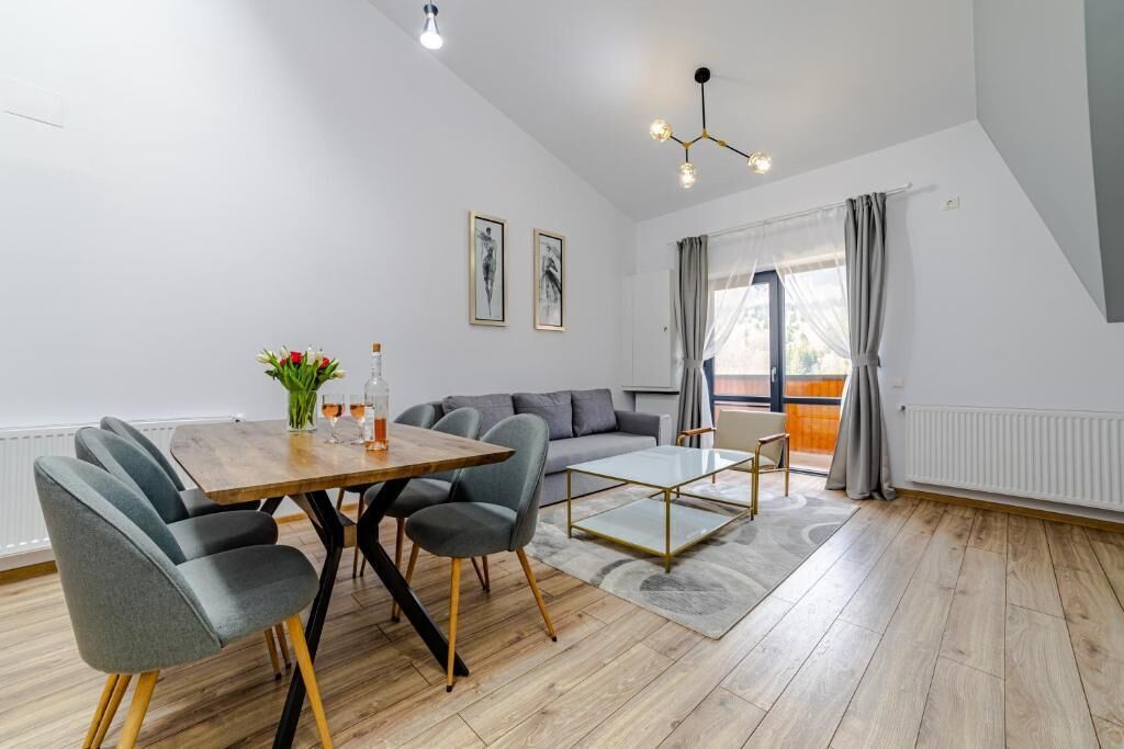 Appartement, 1 kingsize bed met slaapbank, kitchenette, uitzicht op bergen | Dineren
