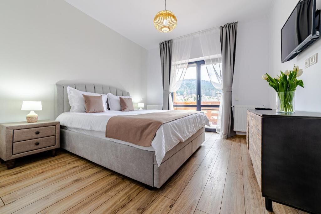 Apartemen, 1 Tempat Tidur King dengan tempat tidur Sofa, dapur kecil, pemandangan gunung | Brankas, setrika/meja setrika, dan Wi-Fi gratis