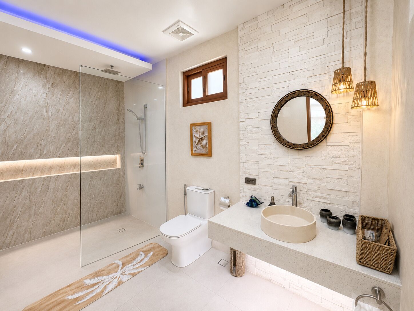 A modern bathroom with a glass-enclosed shower, a toilet, a sink with a round basin, and a mirror with a decorative frame.