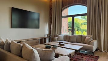 Luxury Villa, Valley View | Living area | 80-cm Smart TV with satellite channels