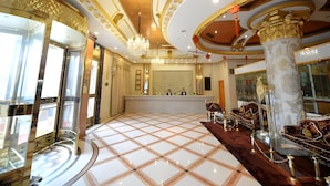 A luxurious lobby with a checkered floor, ornate ceiling, and a reception desk. - Vienna Hotel Shanghai Yangpu Wujiaochang (Shanghai)