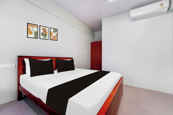 Habitación clásica | Escritorio, wifi gratis y ropa de cama 