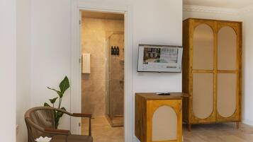 Losta Grand Room | Bathroom | Shower, hair dryer, slippers, towels