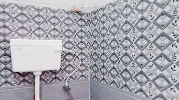 Classic Room | Bathroom | Shower, free toiletries, towels, soap