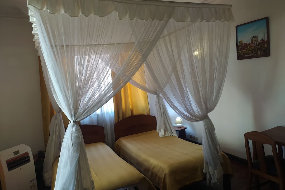 Standard Double Room, Balcony, City View | In-room safe, iron/ironing board, free WiFi