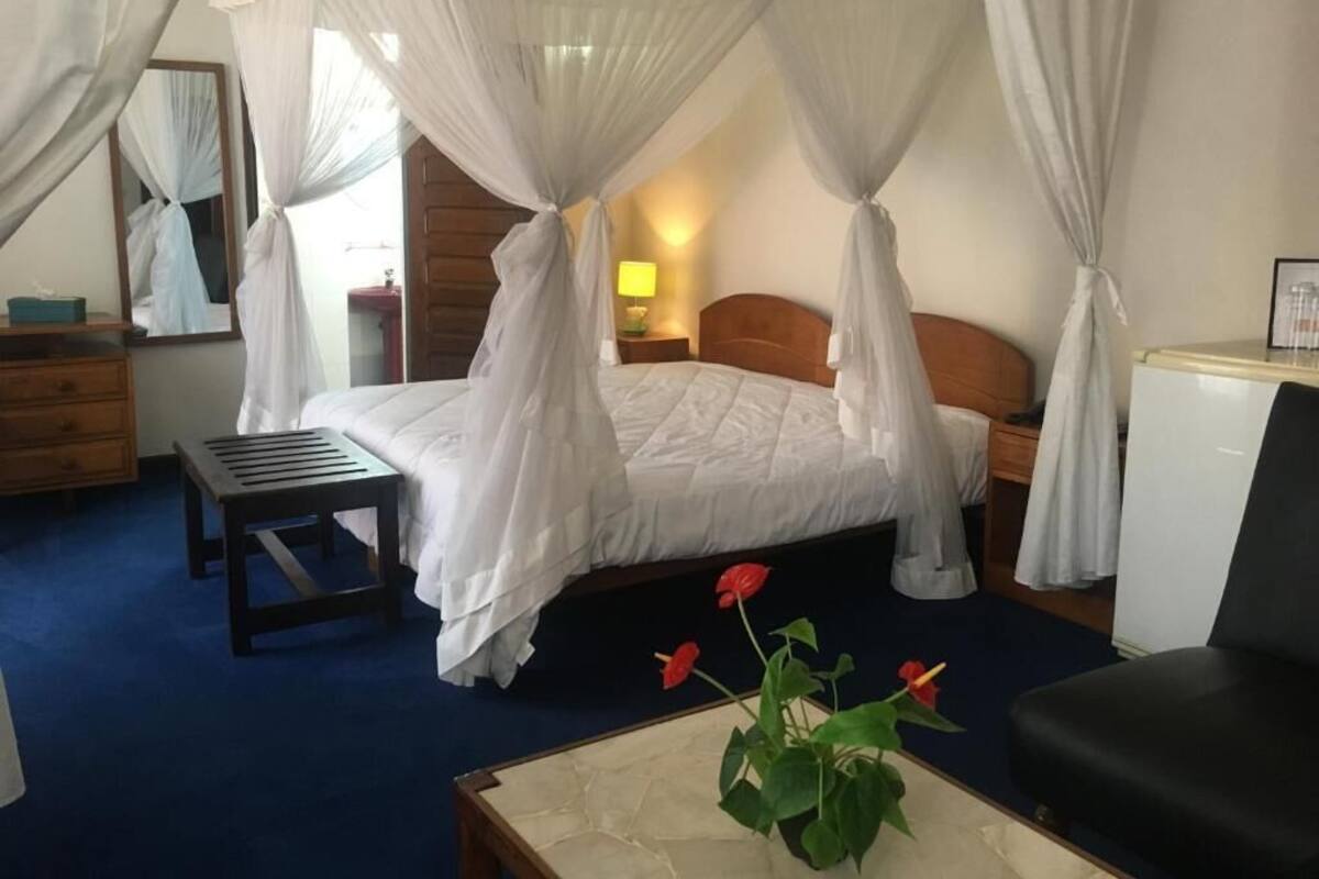 Family Suite, Balcony, City View | In-room safe, iron/ironing board, free WiFi
