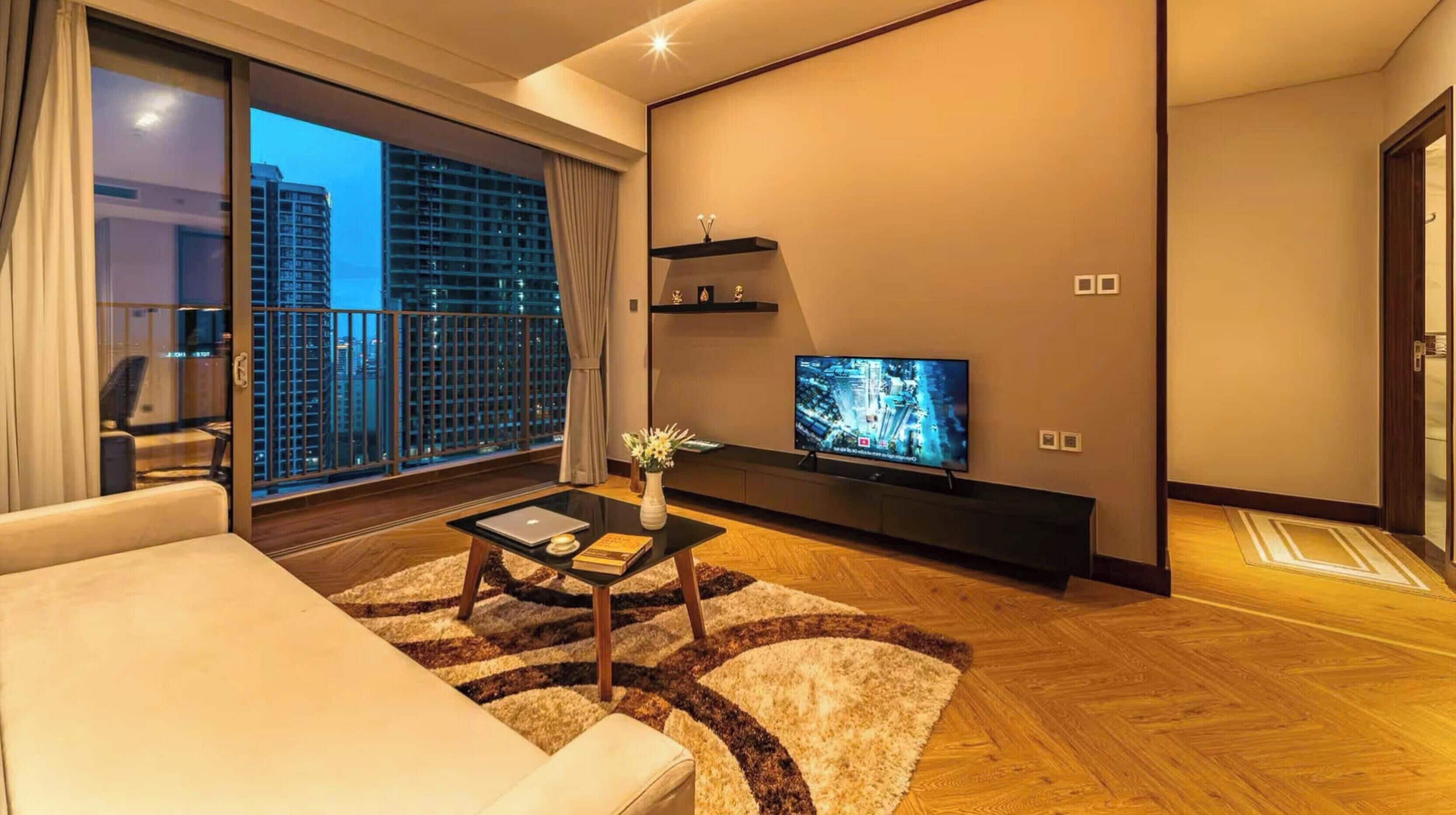 Apartemen Superior, 1 Tempat Tidur King dengan tempat tidur Sofa, balkon, pemandangan kota | Area keluarga