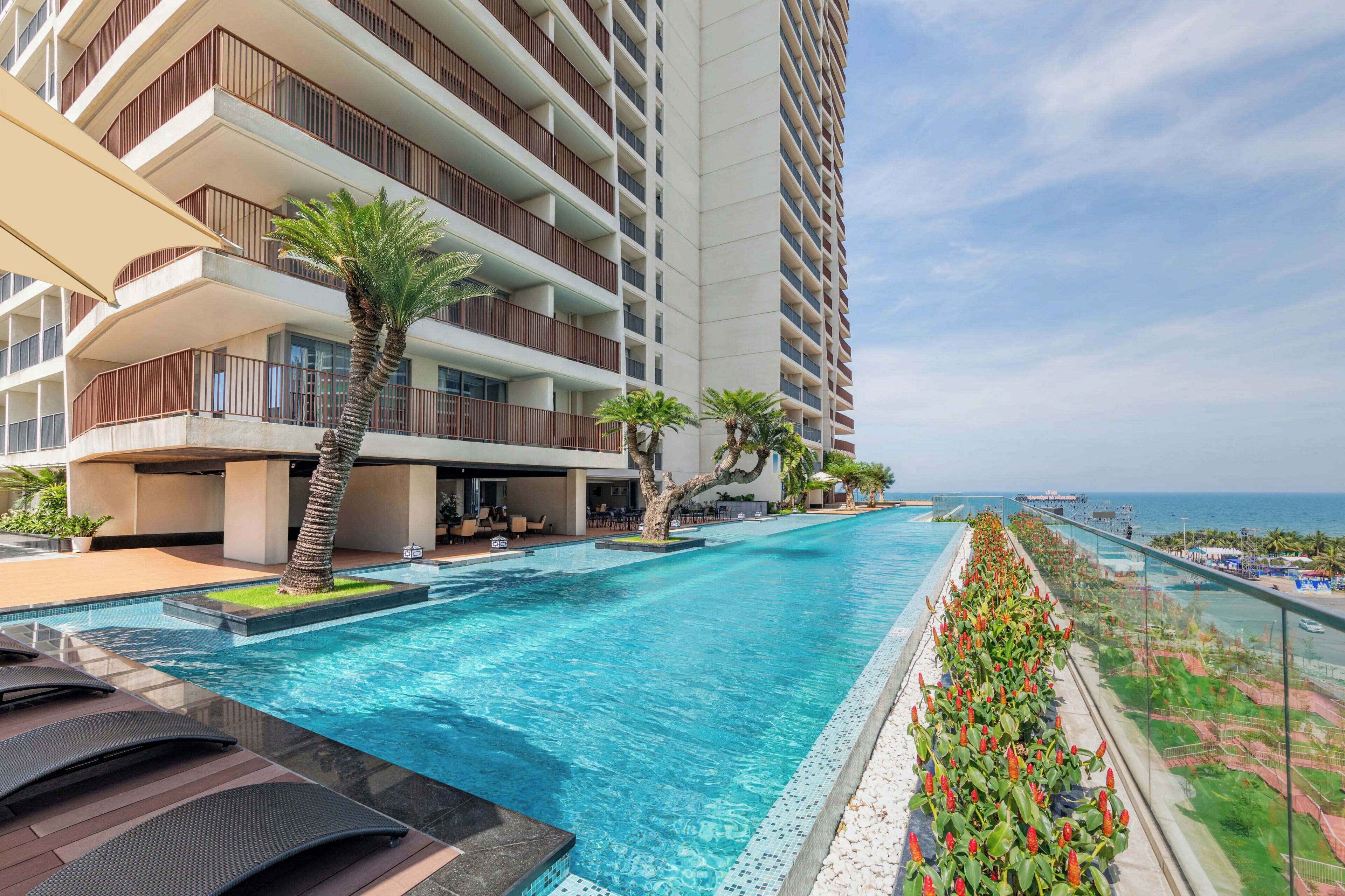 Outdoor pool, open 7:00 AM to 7:00 PM, pool umbrellas, pool loungers