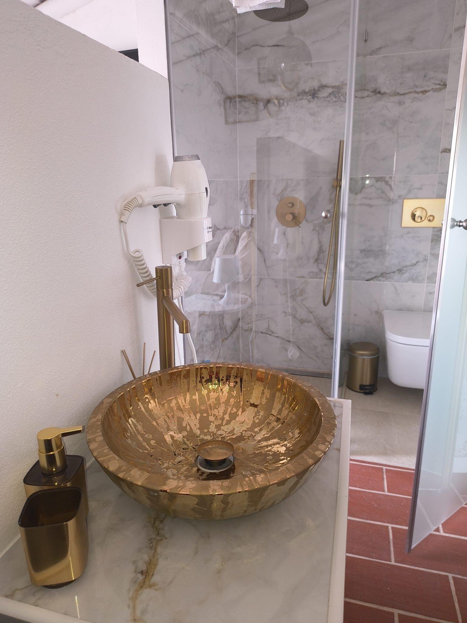 Shower, jetted bath, hair dryer, bidet