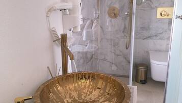 Shower, jetted bath, hair dryer, bidet