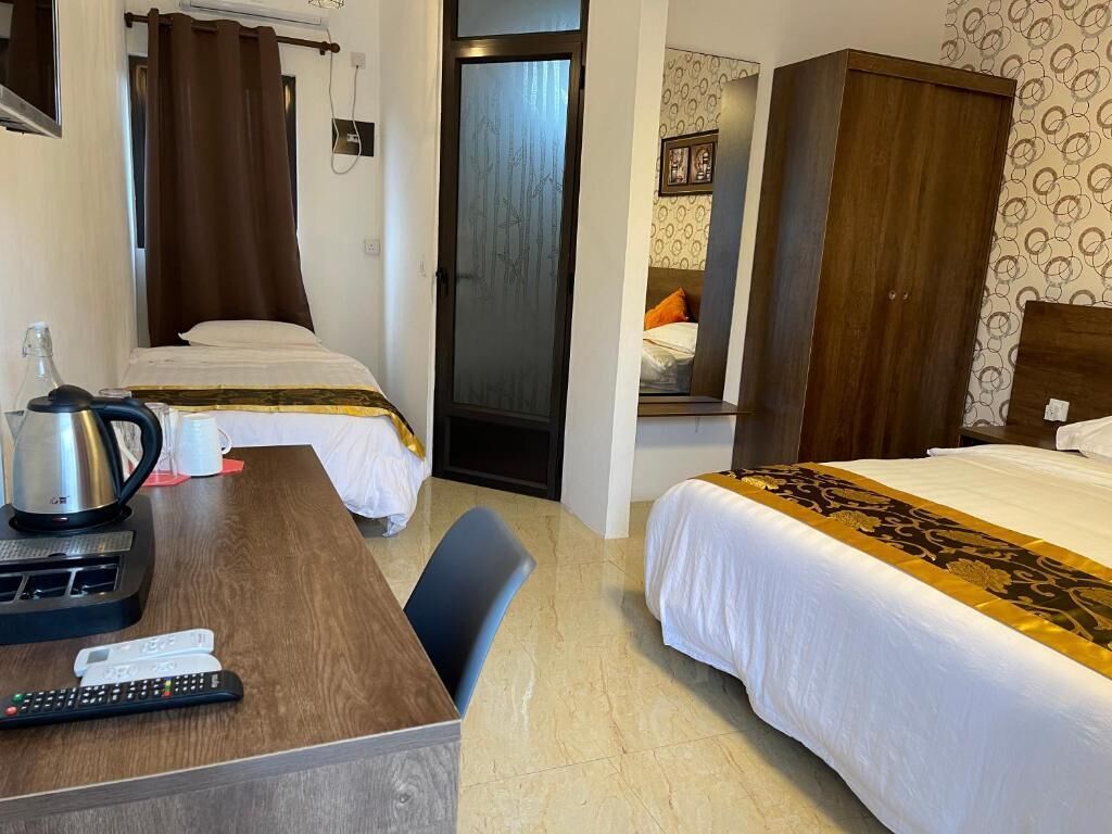 Family Room, Balcony, Courtyard View | In-room safe, soundproofing, free WiFi