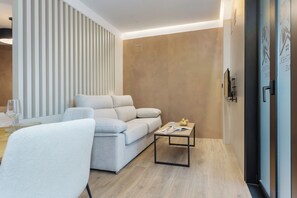 Estudio | Zona de estar | Smart TV de 40 pulgadas con canales por cable
