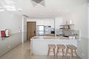 Economy Apartment, Sea View | Private kitchen | Fridge, microwave, oven - El Alamein Towers  (el alamein)