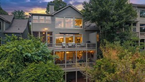 A two-story house with multiple windows and a balcony. - The Perch - Big Canoe, GA (Big Canoe)