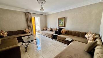 Bungalow Classique, vue piscine | Coin séjour