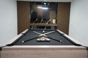 A pool table with balls and cues, a wooden border, and a window with curtains. - Casa Limón l King Bd l pool table l Min to Stadium (Miramar)