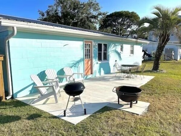 Outdoor dining - Walk to Mashes Sands Beach, boat from your private dock, and bask in Old Florida in this one-story canal-front home (Panacea)