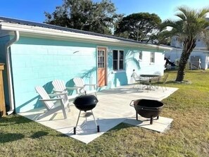 Outdoor dining - Walk to Mashes Sands Beach, boat from your private dock, and bask in Old Florida in this one-story canal-front home (Panacea)