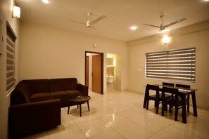 Deluxe Apartment, Balcony, City View | Living area - Cocostay Kozhikode  (Edachira)