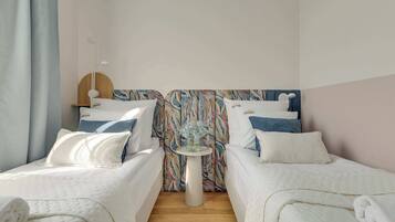 2 bedrooms, desk, iron/ironing board, travel crib