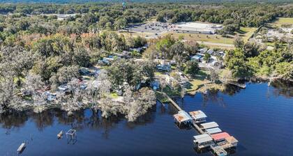Tropical Lakeside Studio in Tiny‑Home Community — Steps to Docks & Fishing