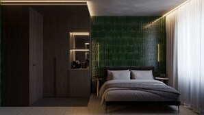 A modern bedroom with a bed, a nightstand, a mirror, and a green textured wall. - Amberlight Boutique Hotel Nº13 | Adults Only|Sauna (Gdańsk)
