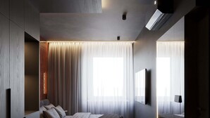 A modern bedroom with a bed, bedside tables, a bench, and a large mirror. - Amberlight Boutique Hotel Nº12 | Adults Only|Sauna (Gdańsk)