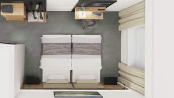 Un dormitorio pequeño con cama, un escritorio y una ventana con cortinas.