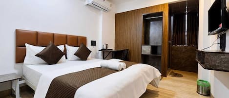 Deluxe Room, City View | Desk, laptop workspace, blackout drapes, WiFi (free)
