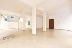 A spacious interior with high ceilings and a large open area.