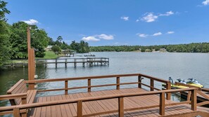 A wooden dock extending into a lake with boats and a gazebo. - Sunset Cove @ Wateree- 2-bedrooms, 2-bathrooms, near Wateree Creek Landing (Winnsboro)