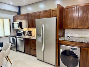 Private kitchen - Walk the Heart of San Pedro VIVA 201 Modern 2BR (San Pedro)