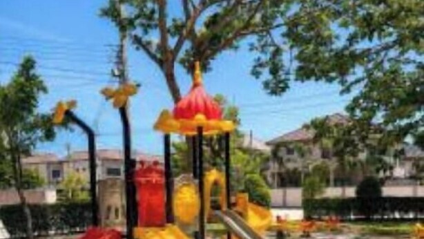 A playground with a slide and climbing structures. - Paradise Away From Home | Elegant Lakeview Villa with Pool in Central Pattaya (Chon Buri)