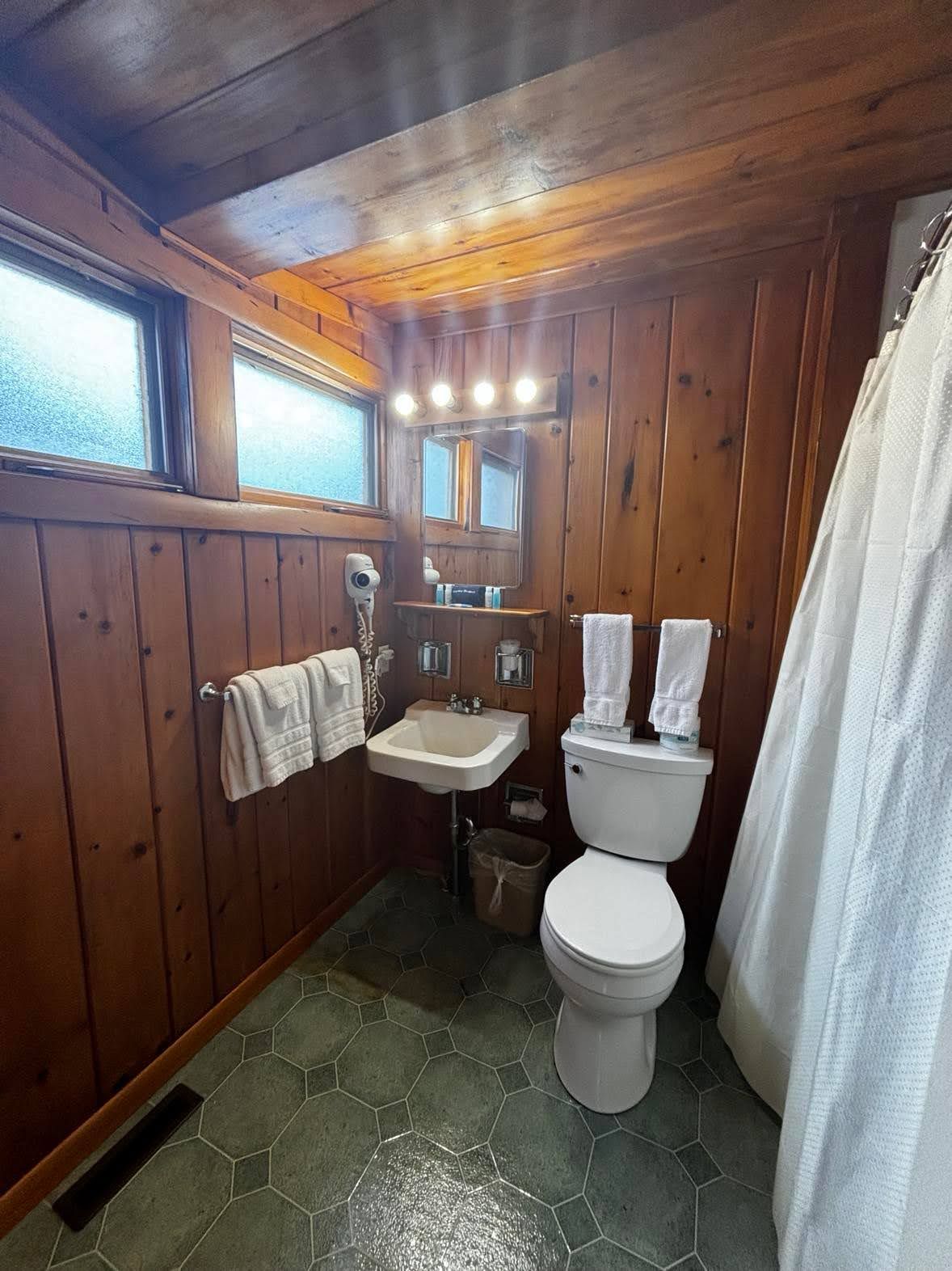 Hair dryer, towels, soap, toilet paper