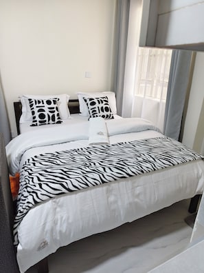 Acesso à internet, roupa de cama