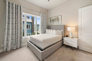Soft sheets, quiet surroundings, and a room that makes sleeping in feel completely justified. - Luxury Reunion Retreat Patio Views Near Disney (Kissimmee)