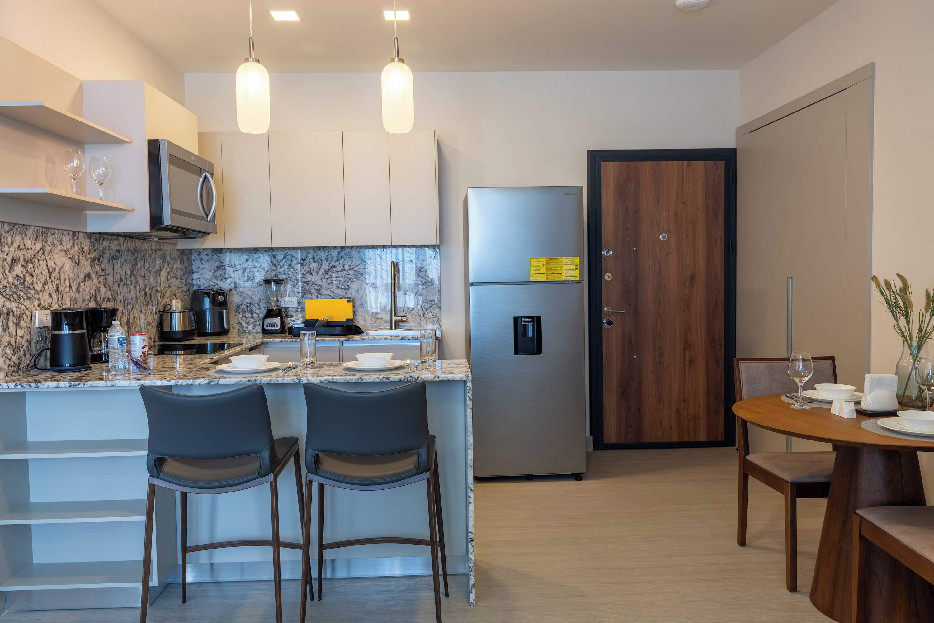 Coffee/tea maker, fridge, microwave, oven