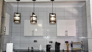 Departamento Confort, balcón | Cocina privada