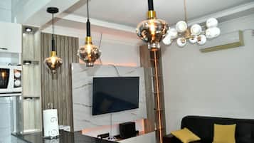 Departamento Confort, balcón | Área de sala de estar